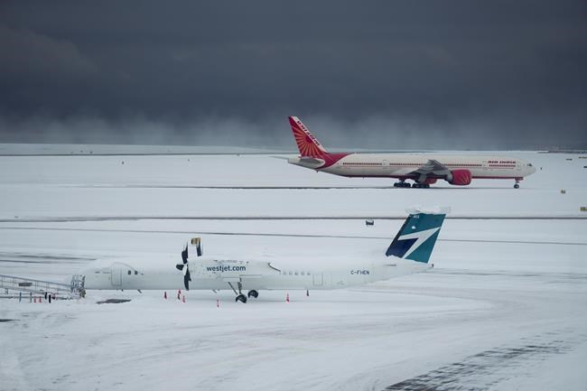 Extreme cold leads to flight cancellations in BC, Alberta : In The News for Dec. 21 | iNFOnews.ca