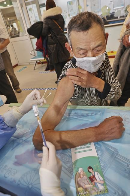 China races to vaccinate elderly, but many are reluctant | iNFOnews.ca