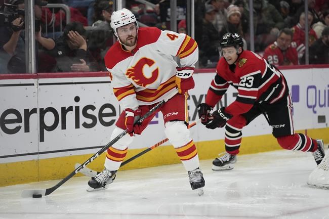 Flames defenceman Andersson hurt after being struck by vehicle while riding scooter | iNFOnews.ca