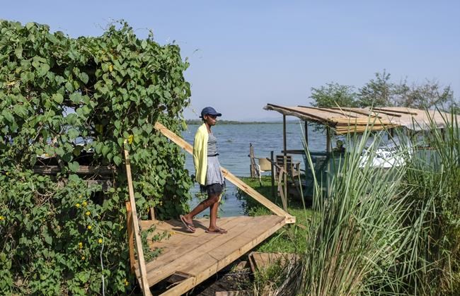 Recycling lake litter, Ugandan makes innovative tourist boat | iNFOnews.ca Recycling lake litter, Ugandan makes innovative tourist boat | iNFOnews.ca