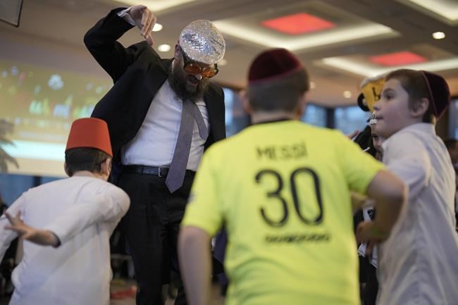 Ukrainian refugees celebrate Purim in Berlin as war drags on | iNFOnews.ca Ukrainian refugees celebrate Purim in Berlin as war drags on | iNFOnews.ca