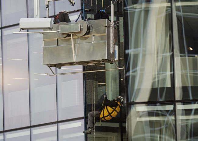 Emergency crews respond to window cleaning platform stuck on Vancouver building | iNFOnews.ca