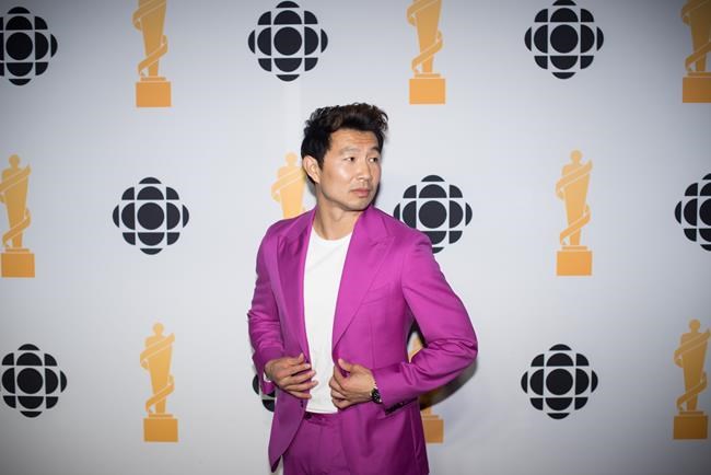 Topless protestor crashes Junos, as Weeknd wins 5th award with album of the year | iNFOnews.ca
