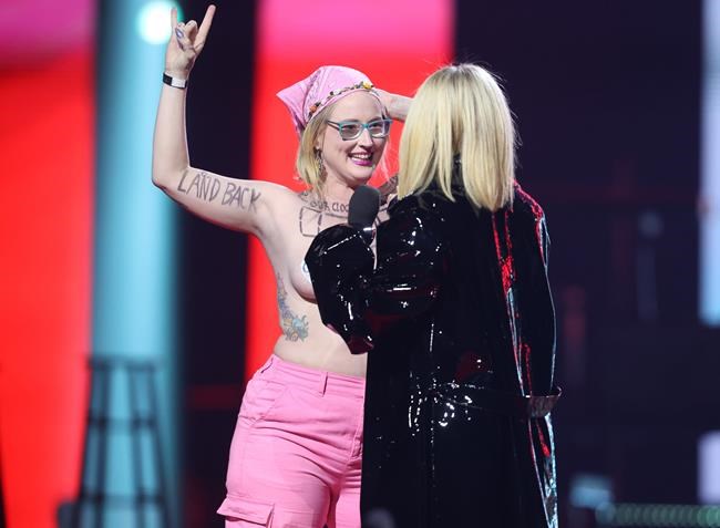 'Just tell Avril I'm not mad,' says topless Junos protester after being charged | iNFOnews.ca