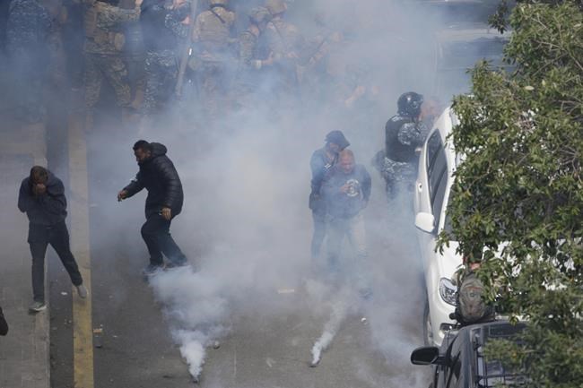 Tear gas, clashes as Lebanon protesters try to storm govt HQ | iNFOnews.ca Tear gas, clashes as Lebanon protesters try to storm govt HQ | iNFOnews.ca