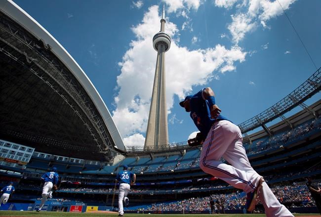 Rogers Centre roof open for Jays-Tigers game; earliest opening in franchise history | iNFOnews.ca