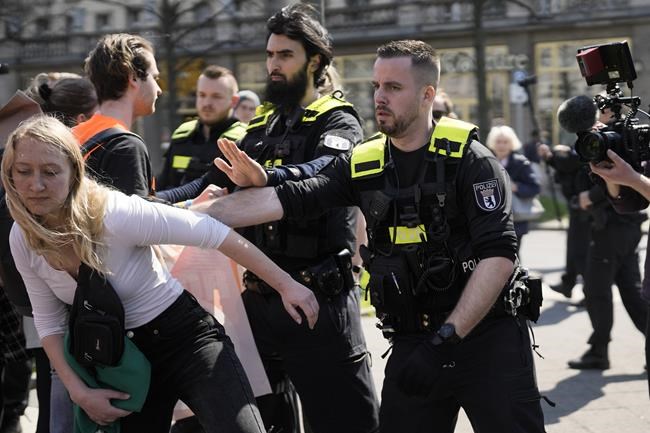 Climate activists stage slow march through German capital | iNFOnews.ca CP241006498
