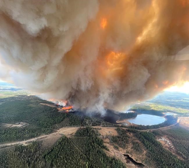 Several thousand people forced from homes as wildfires burn across Alberta | iNFOnews.ca