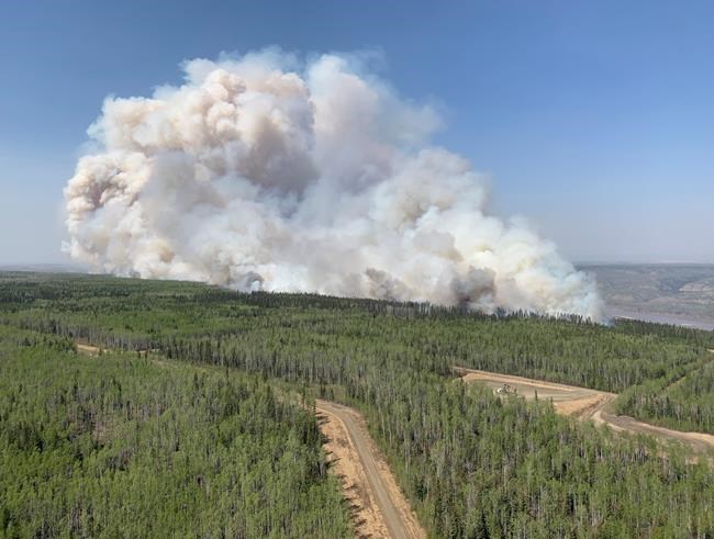 Alberta officials say cooler weather and showers help in battle against wildfires | iNFOnews.ca