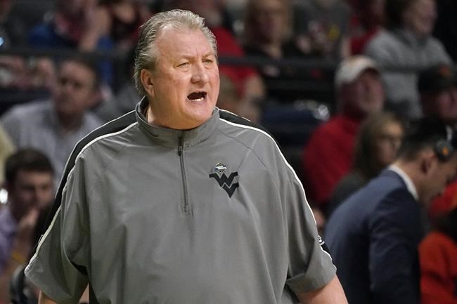 West Virginia's Huggins agrees to $1M pay cut, 3-game suspension for homophobic slur | iNFOnews.ca