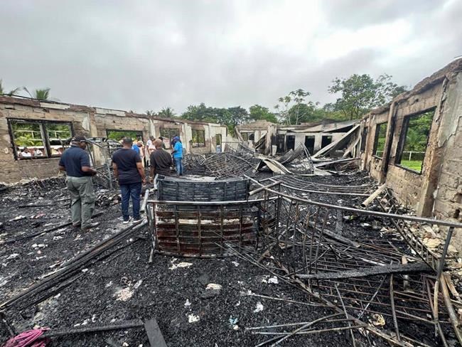 Teenage girl in Guyana charged as adult with 19 counts of murder in dormitory fire | iNFOnews.ca Teenage girl in Guyana charged as adult with 19 counts of murder in dormitory fire | iNFOnews.ca