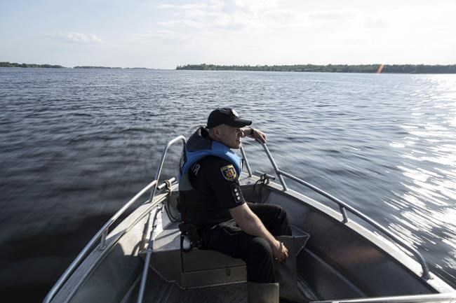 Damage to Russian-occupied dam submerges Ukrainian reservoir island community | iNFOnews.ca