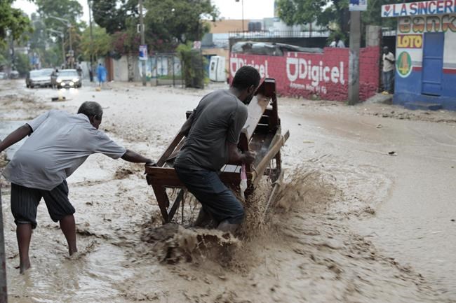 15 dead, 8 missing after heavy rains unleash floods in Haiti | iNFOnews.ca