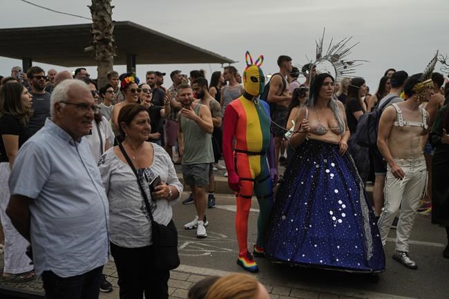 Tens of thousands join Tel Aviv Pride parade, celebrating gains and wary of Israeli government | iNFOnews.ca Tens of thousands join Tel Aviv Pride parade, celebrating gains and wary of Israeli government | iNFOnews.ca