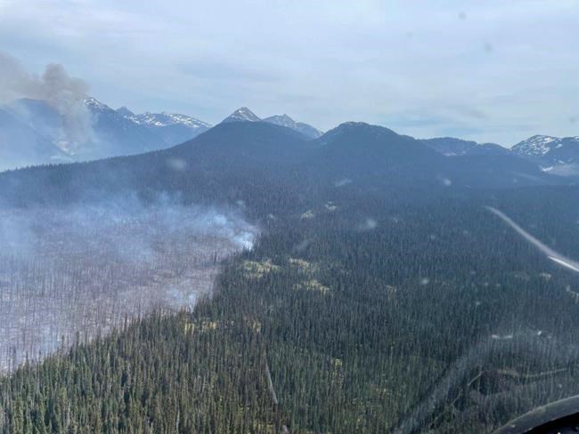 Hundreds more properties on alert as winds fan massive northeast B.C. wildfire | iNFOnews.ca Hundreds more properties on alert as winds fan massive northeast B.C. wildfire | iNFOnews.ca