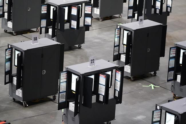 Critics blast Georgia's plan to delay software updates on its voting machines | iNFOnews.ca