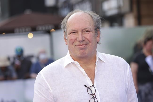 Film composer Hans Zimmer proposes to his partner on London stage, prompts raucous audience response | iNFOnews.ca