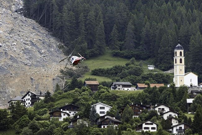 Mass of rock slides down Swiss mountainside above evacuated village, narrowly missing settlement | iNFOnews.ca Mass of rock slides down Swiss mountainside above evacuated village, narrowly missing settlement | iNFOnews.ca