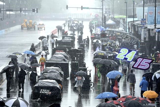 Heavy rains flood Chicago roads and force NASCAR to cut short a downtown street race | iNFOnews.ca Heavy rains flood Chicago roads and force NASCAR to cut short a downtown street race | iNFOnews.ca