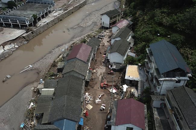 Flooding displaces 10,000 around China as Beijing gets a relative respite from sweltering heat | iNFOnews.ca