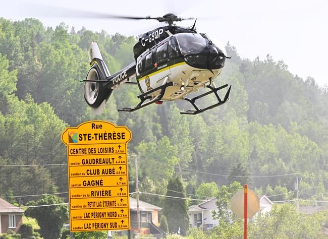 Search for two people missing after Quebec landslide a 'colossal' task: police | iNFOnews.ca Search for two people missing after Quebec landslide a 'colossal' task: police | iNFOnews.ca