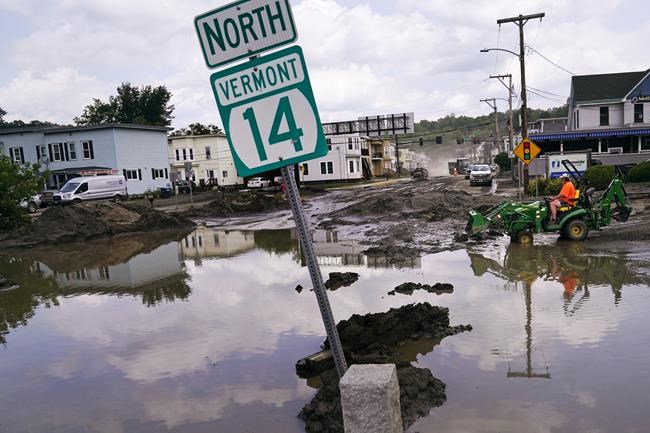 Snow shovels in hand, volunteers help Vermont communities clear the mud from epic floods | iNFOnews.ca