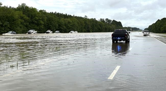People rescued from cars and homes as torrential rain causes flash flooding in central Mississippi | iNFOnews.ca People rescued from cars and homes as torrential rain causes flash flooding in central Mississippi | iNFOnews.ca