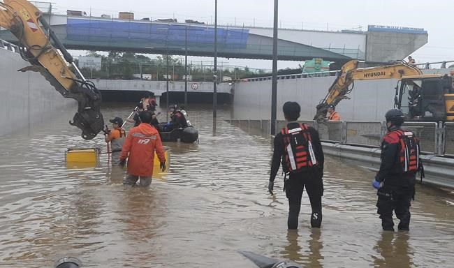 9 bodies pulled from a flooded road tunnel in South Korea as rains cause flash floods and landslides | iNFOnews.ca 9 bodies pulled from a flooded road tunnel in South Korea as rains cause flash floods and landslides | iNFOnews.ca