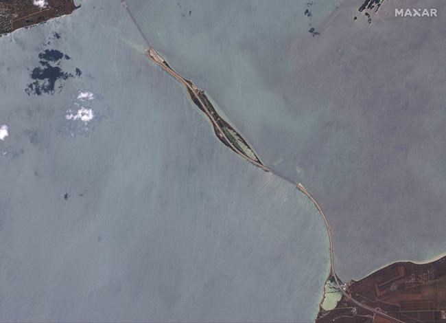 Key Russian bridge to Crimea is struck again as Putin vows response to attack that killed 2 | iNFOnews.ca Key Russian bridge to Crimea is struck again as Putin vows response to attack that killed 2 | iNFOnews.ca