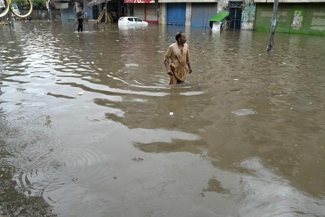11 dead after a wall collapses near an under-construction bridge in Pakistan during monsoon rains | iNFOnews.ca
