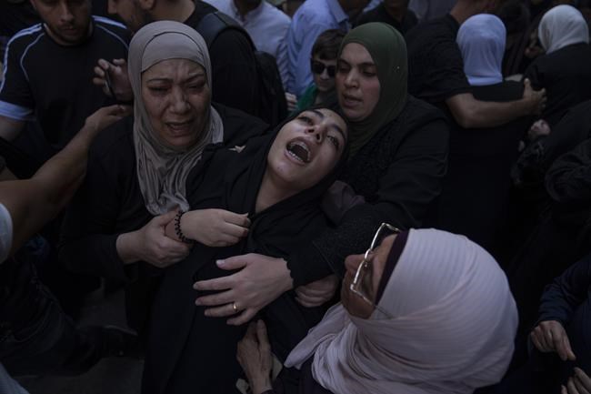 Israeli army kills 14-year-old Palestinian as an Israeli minister visits a flashpoint holy site | iNFOnews.ca