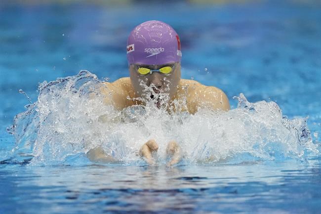 Qin Haiyang of China sets a world record in the men's 200-meter breaststroke at world championships | iNFOnews.ca
