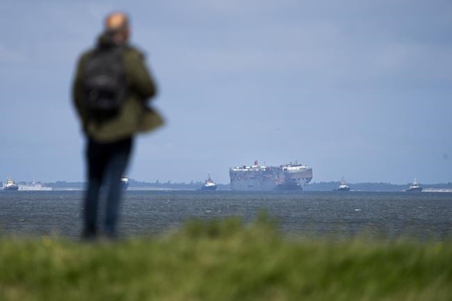 A car-carrying ship that burned for a week on the North Sea is towed to a Dutch port for salvaging | iNFOnews.ca