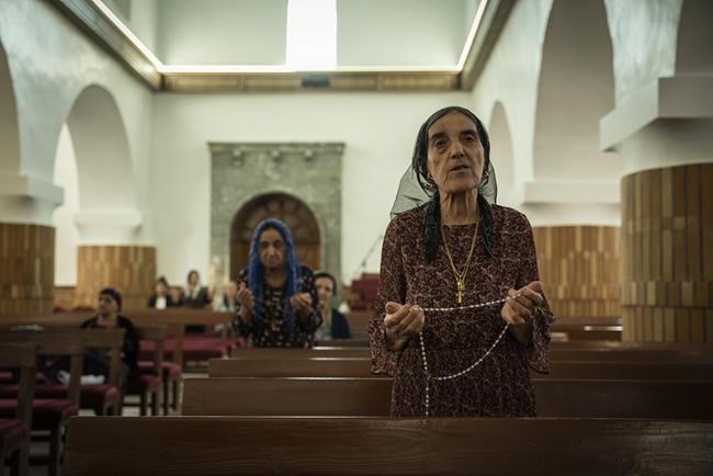 A feud between a patriarch and a militia leader adds to the woes of Iraqi Christians | iNFOnews.ca