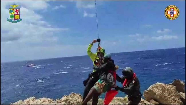 Dozens saved by Italy from migrant shipwrecks; some, clinging to rocks, plucked to safety by copters | iNFOnews.ca