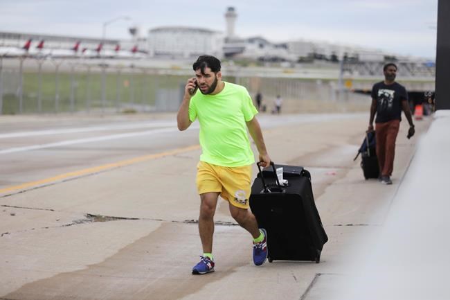 Floods fill tunnels leading to Detroit airport, force water rescues in Ohio and Las Vegas | iNFOnews.ca Floods fill tunnels leading to Detroit airport, force water rescues in Ohio and Las Vegas | iNFOnews.ca