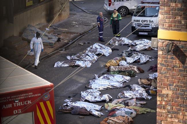 At least 74 are dead, many of them homeless, as fire rips through a rundown building in South Africa | iNFOnews.ca