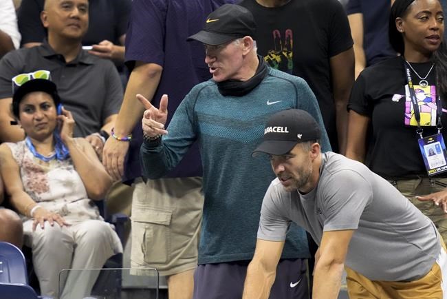 Climate protester glues feet to floor at US Open, interrupts Coco Gauff's semifinal win over Muchova | iNFOnews.ca