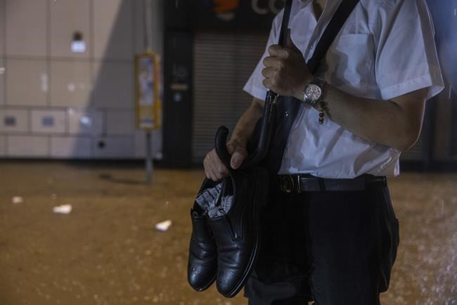 Hong Kong closes schools as torrential rain floods streets, subway station | iNFOnews.ca