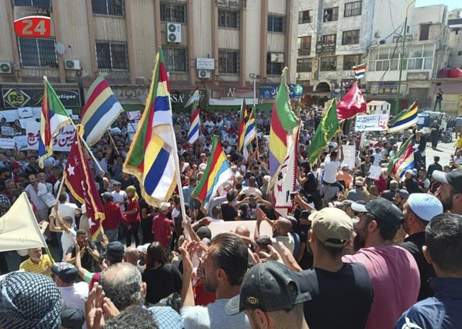 US-backed Kurdish fighters say battles with tribesmen in eastern Syria that killed dozens have ended | iNFOnews.ca