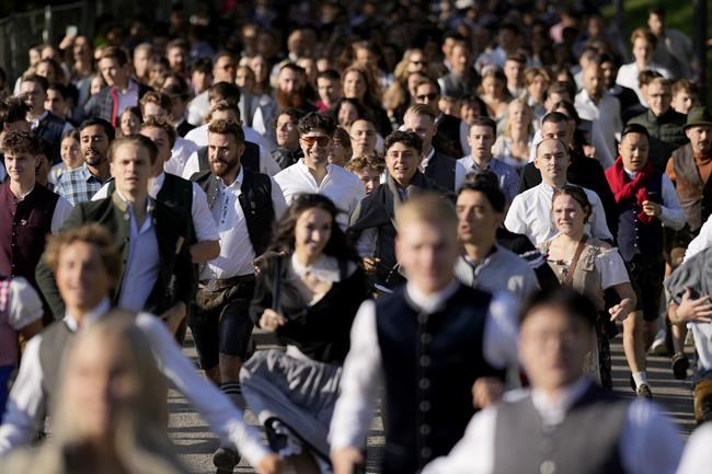 Beer flows and crowds descend on Munich for the official start of Oktoberfest | iNFOnews.ca