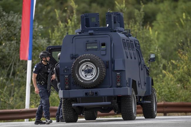 Kosovar police surround a village after Serb gunmen storm a monastery in violence that has killed 4 | iNFOnews.ca