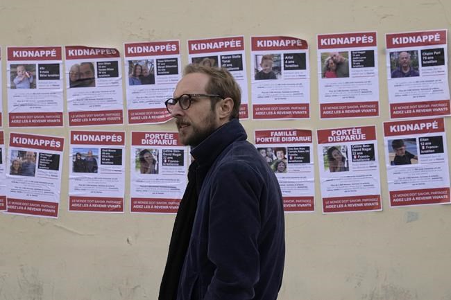 Jewish students plaster Paris walls with photos of French citizens believed held hostage by Hamas | iNFOnews.ca