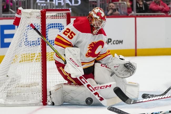 Phillips scores against old team, Capitals beat Flames 3-2 in shootout | iNFOnews.ca