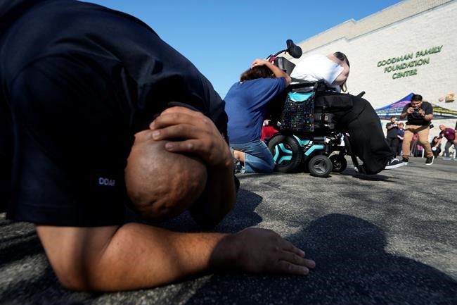 Residents of earthquake zones 'drop, cover and hold on' during annual ShakeOut quake drill | iNFOnews.ca Residents of earthquake zones 'drop, cover and hold on' during annual ShakeOut quake drill | iNFOnews.ca