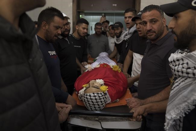 Palestinian death toll in West Bank surges as Israel pursues militants following Hamas rampage | iNFOnews.ca