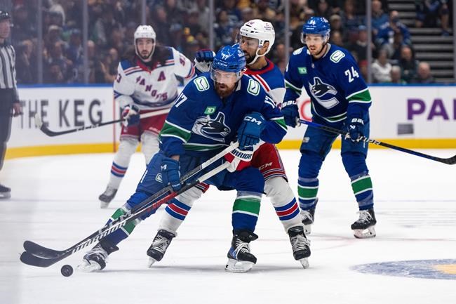 Rangers trip Canucks 4-3 in overtime thriller | iNFOnews.ca