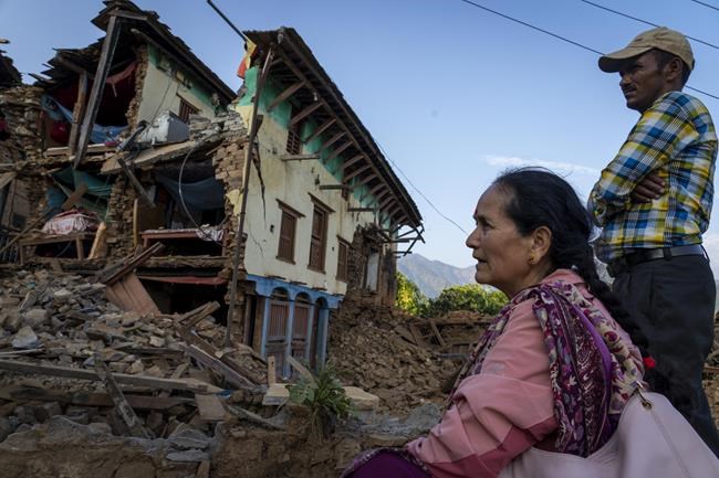 Nepal villagers cremate loved ones who perished in an earthquake that killed 157 people | iNFOnews.ca