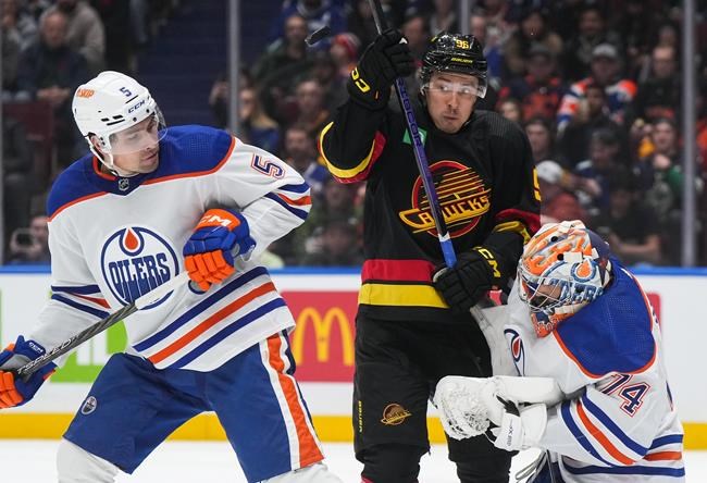 Boeser scores two, Hughes nets four points as surging Canucks whip Oilers 6-2 | iNFOnews.ca