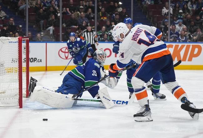 Quinn Hughes scores OT winner as Canucks claw out 4-3 win over Islanders | iNFOnews.ca